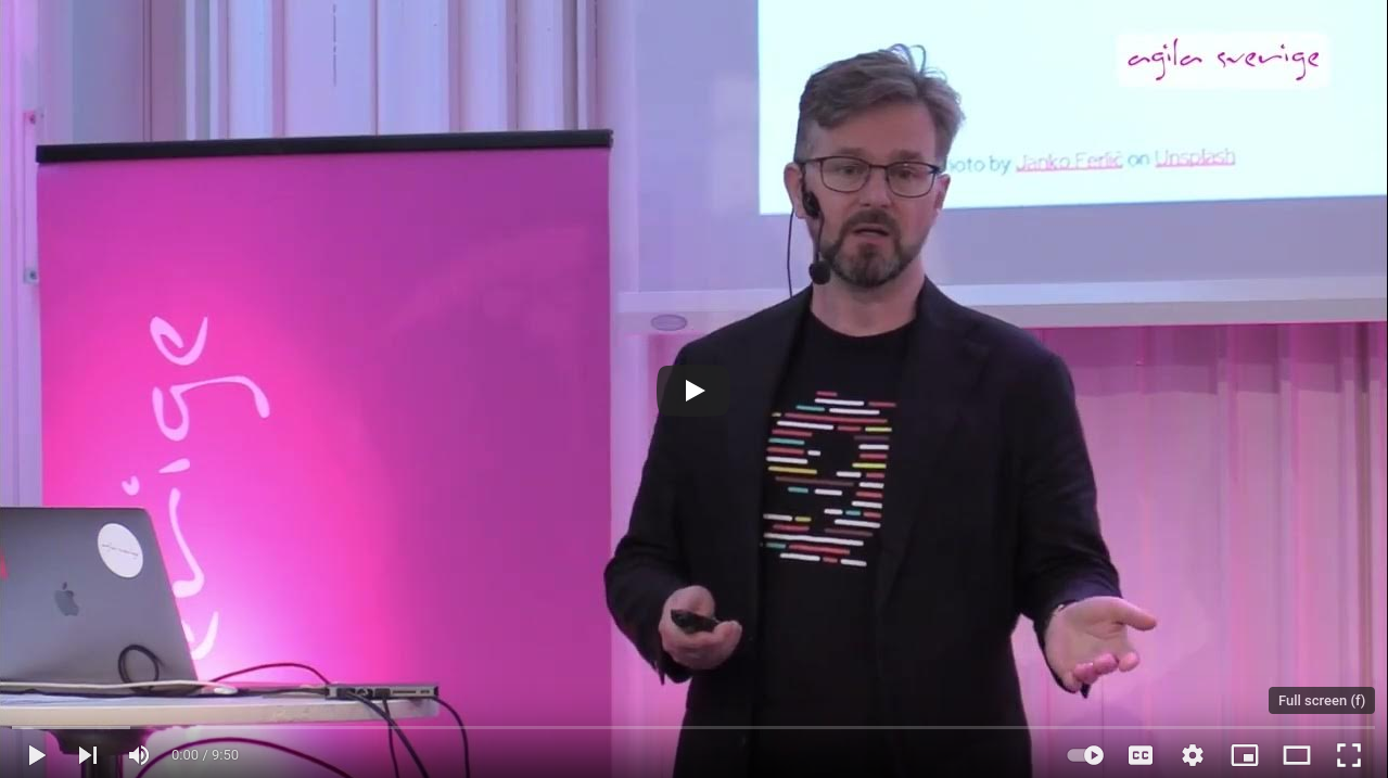 A screenshot from the recorded talk on YouTube showing me mid-sentence.
